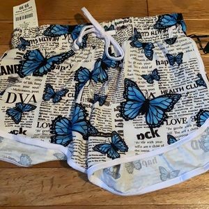 Comfy shorts. With cute butterfly newspaper design